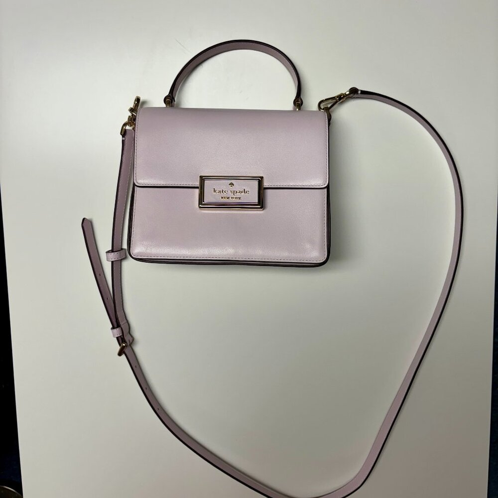 Lavender Kate Spade handbag with crossbody strap